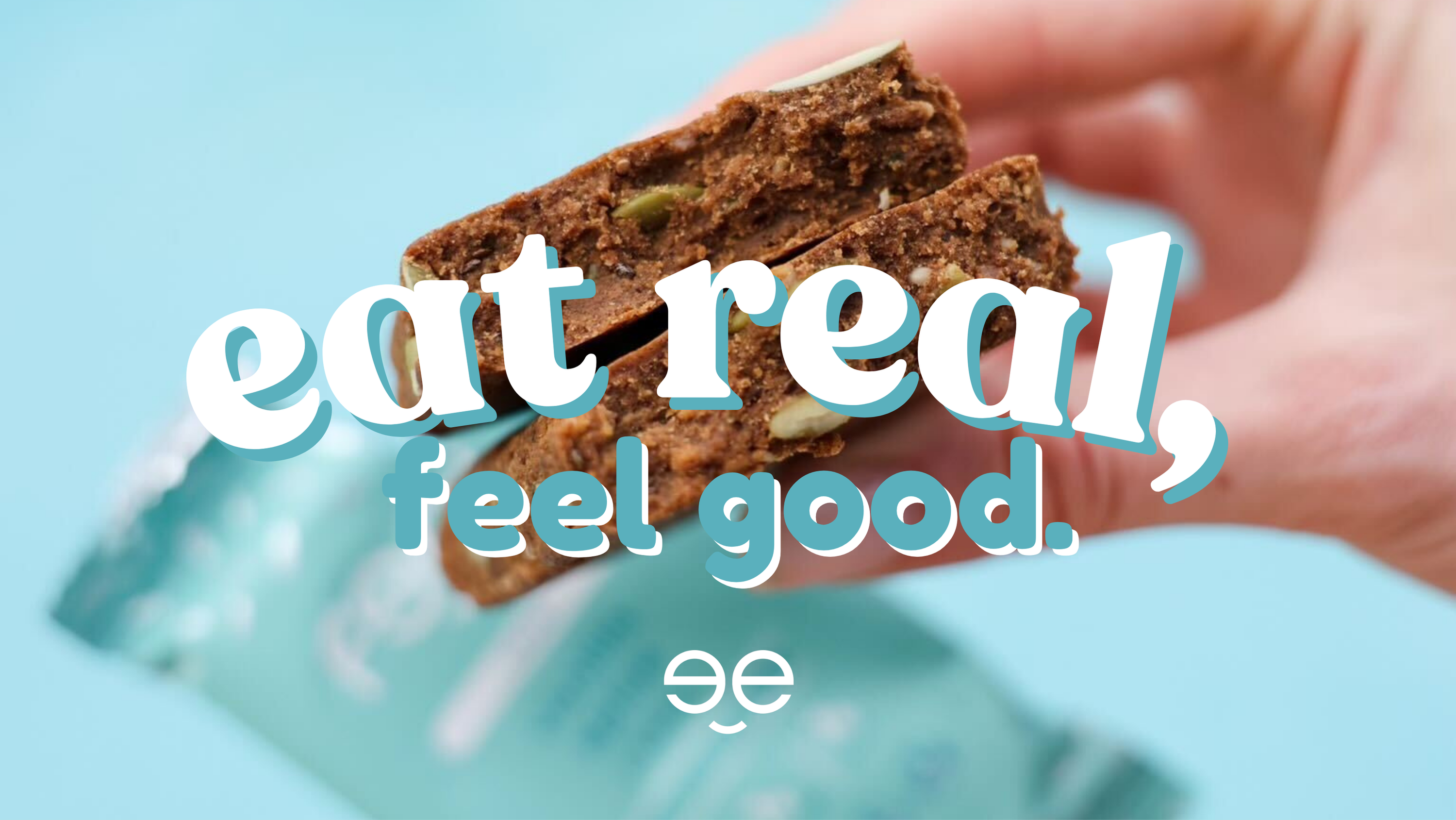 Close-up of a Feel Bar Vanilla Spice plant protein bar with visible seeds and natural texture, slogan ‘eat real, feel good’ promoting whole-food, clean nutrition